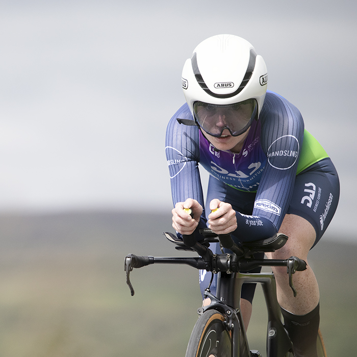 British National Road Championships 2024 -  Women’s Time Trial - Lucy Lee tackles a climb with open countryside behind her