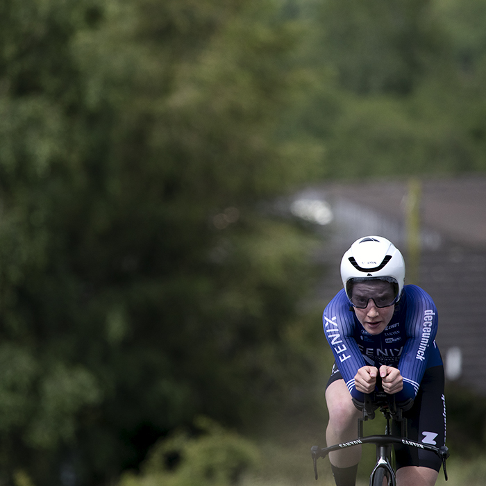 British National Road Championships 2024 - Women’s U23 Time Trial - Flora Perkins takes on the course with a farm building behind her