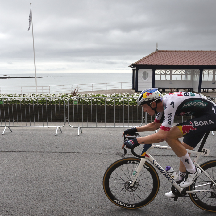 British National Road Championships 2025 - Road Race - Men - Callum Thornley of Red Bull - BORA - hansgrohe Rookies races past a seafront shelter