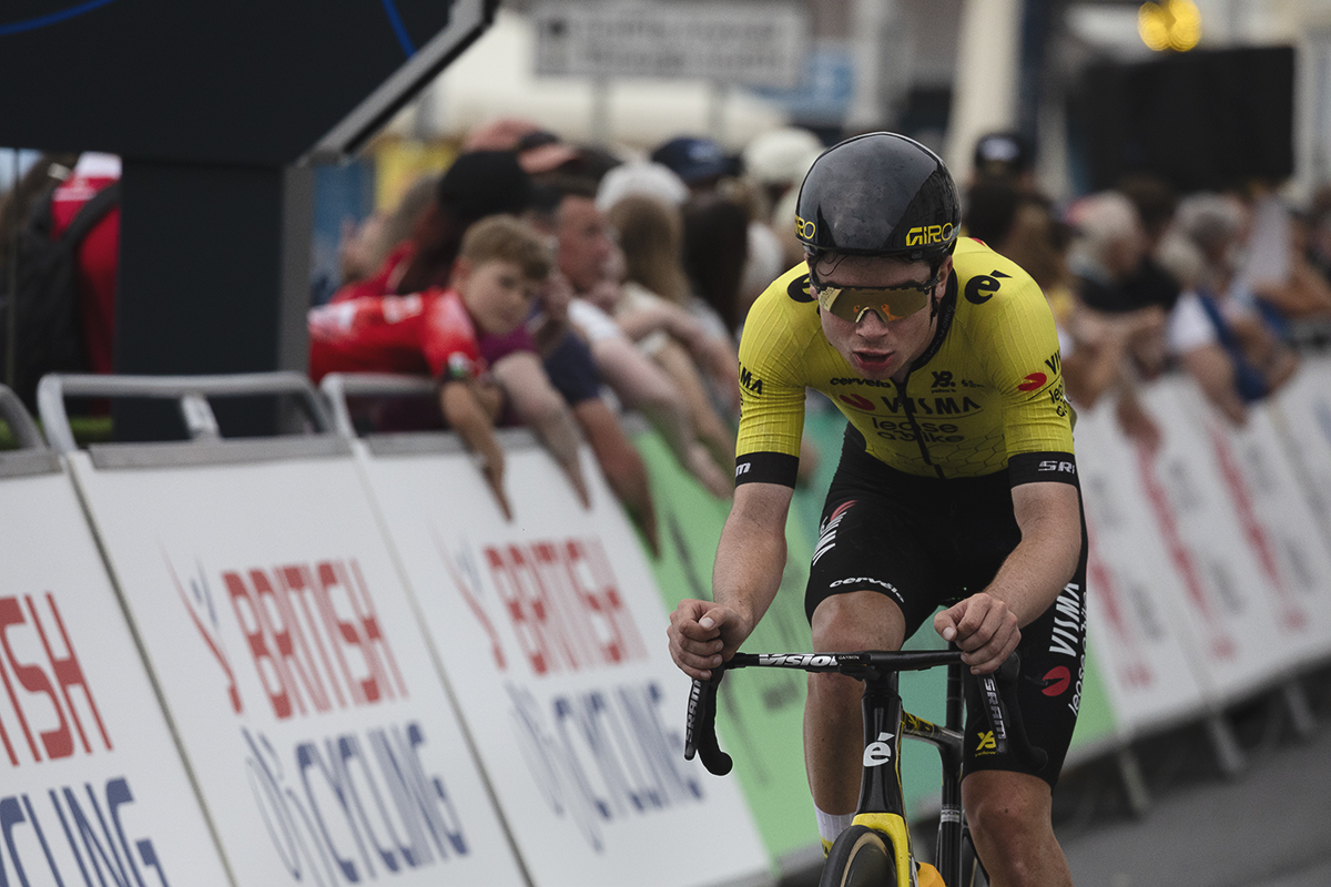 British National Road Championships 2025 - Road Race - Men - Tomos Pattinson of Team Visma - Lease a Bike Development Team passes fans who bang on the hoardings to encourage him