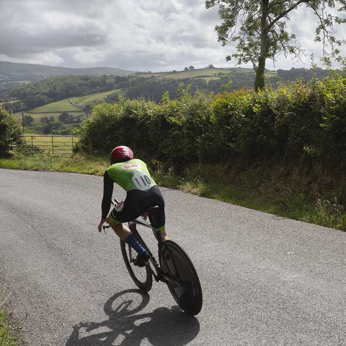 British National Road Championships 2025 - Time Trial - U23 Men - Jack Brough with views of the rolling Welsh hills in the background