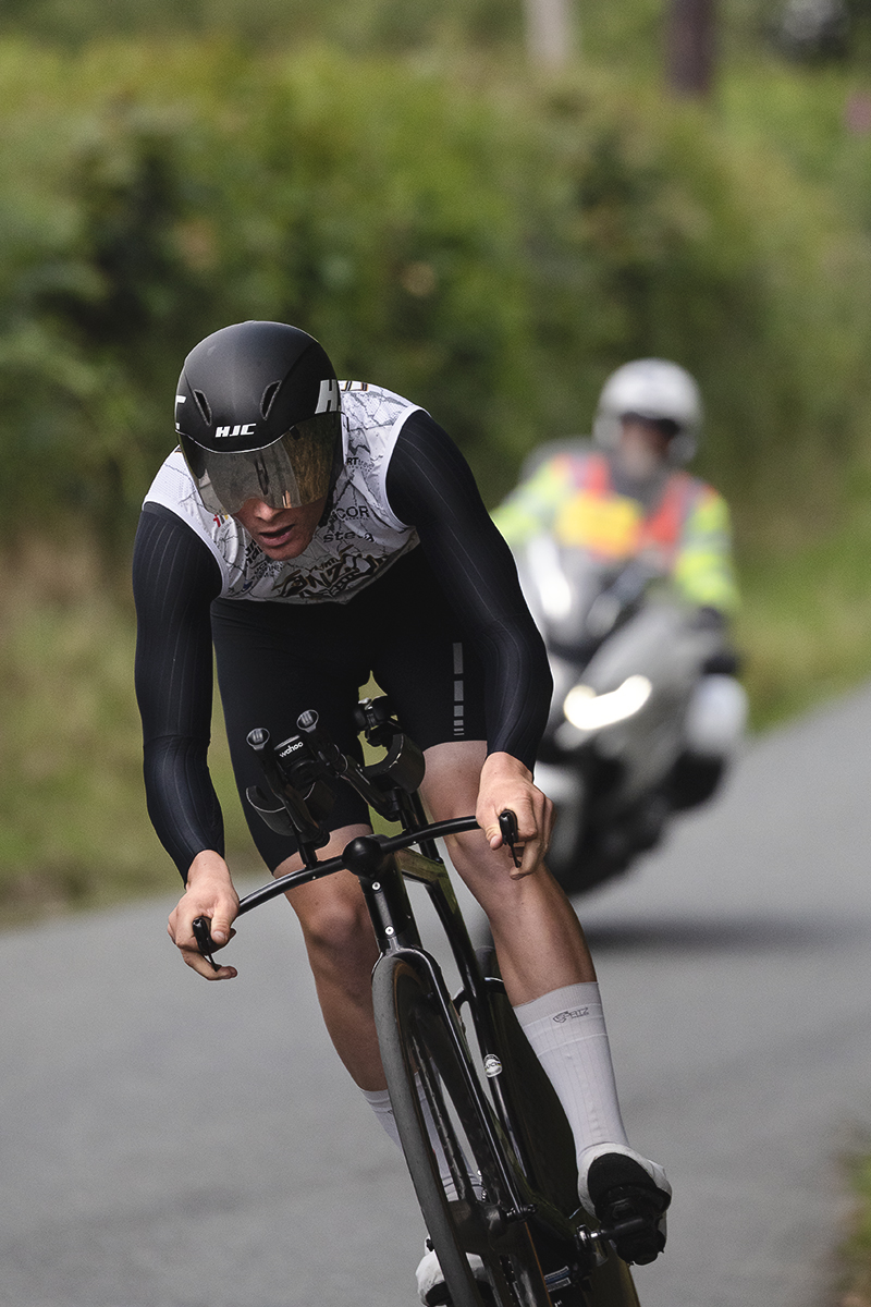 British National Road Championships 2025 - Time Trial - U23 Men - Tom Williams of Monzon - Incolor - Gub is followed by a motorbike outrider during his effort