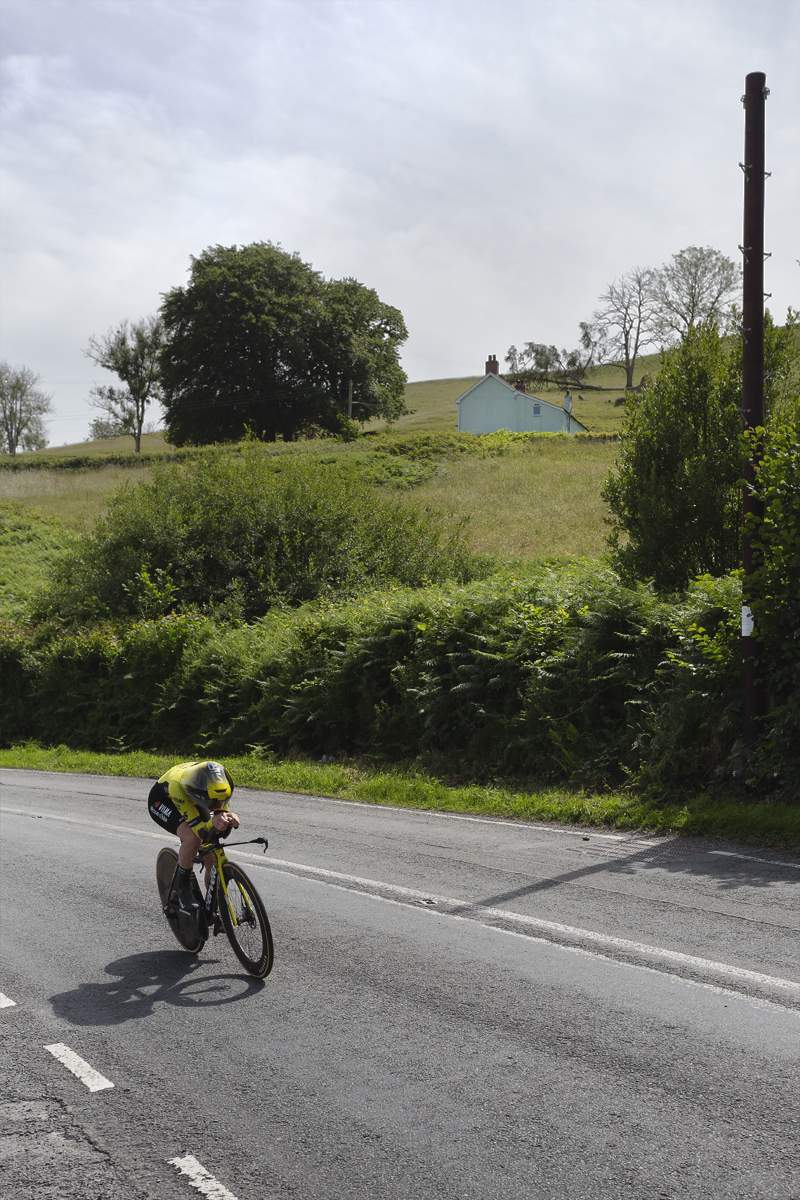 British National Road Championships 2025 - Time Trial - U23 Women - Imogen Wolff of Team Visma - Lease a Bike races in the time trial with a whitewashed house in the background