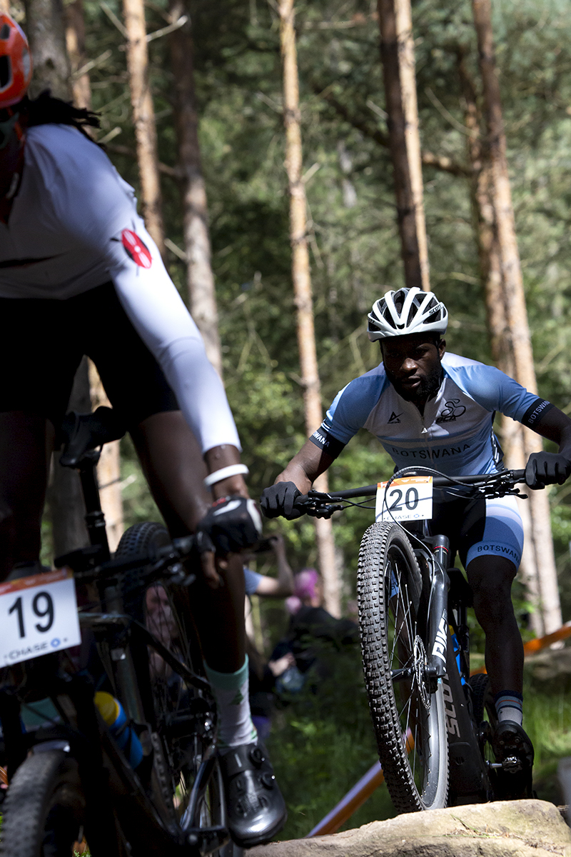 Birmingham 2022 - XXII Commonwealth Games - Mountain Bike - Men - Gontse Lethokwe of Botswana rides over rocks