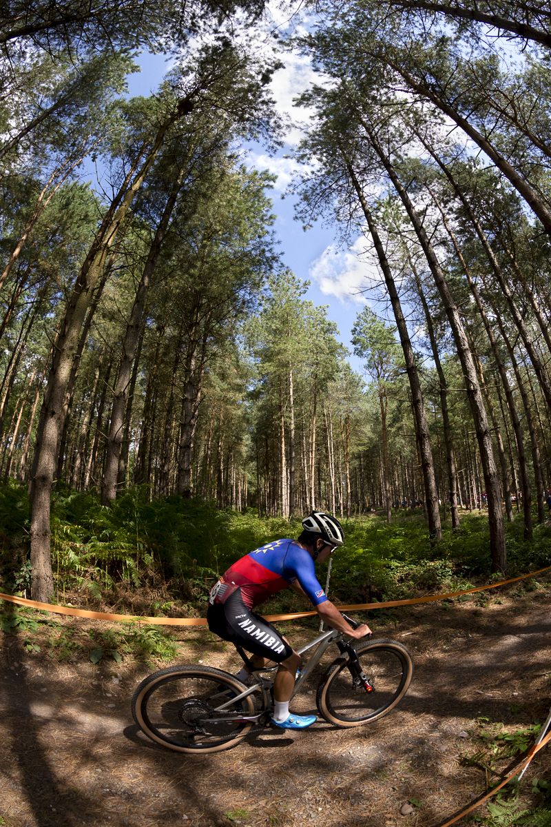 Birmingham 2022 - XXII Commonwealth Games - Mountain Bike - Men - Hugo Hahn of Namibia races through a woodland glade