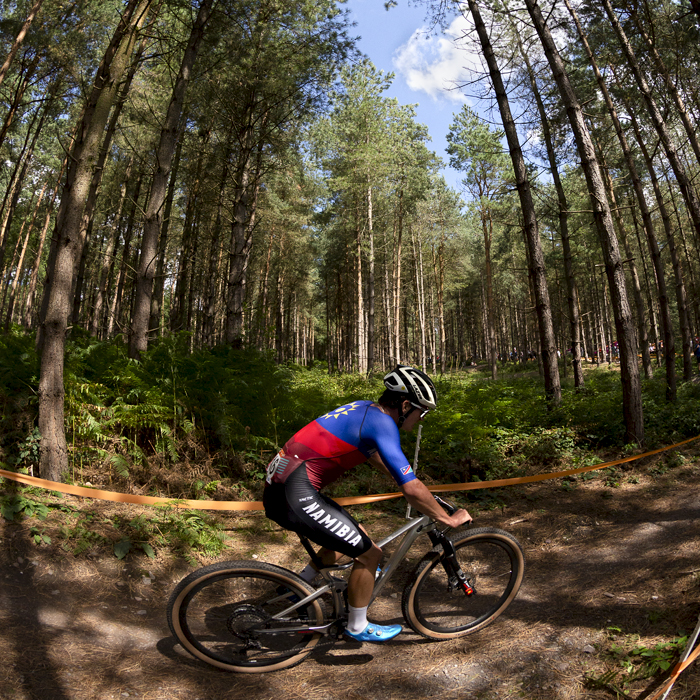 Birmingham 2022 - XXII Commonwealth Games - Mountain Bike - Men - Hugo Hahn of Namibia races through a woodland glade