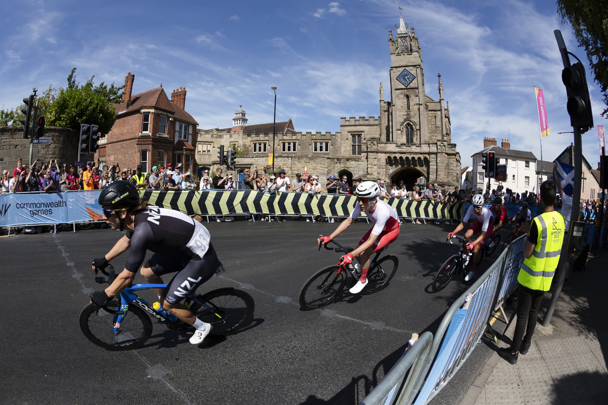 Birmingham 2022 - XXII Commonwealth Games - Men’s Road Race - New Zealand’s Aaron Gate rounds the corner outside Eastgate, Warwick