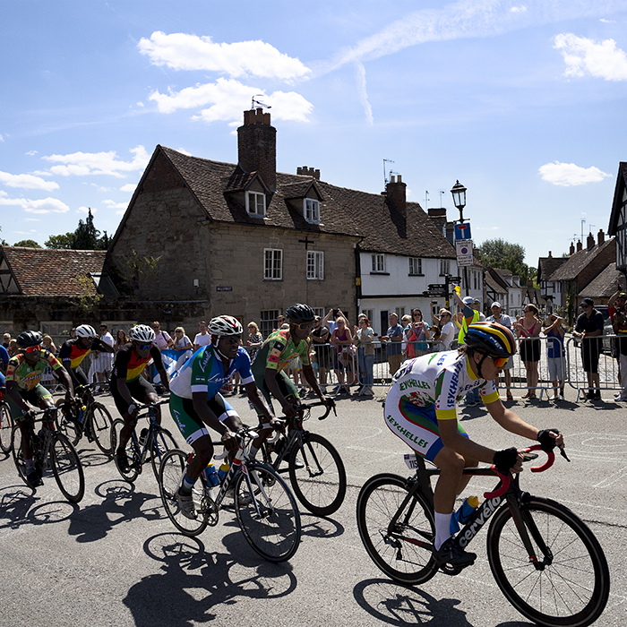 Birmingham 2022 - XXII Commonwealth Games - Men’s Road Race - The riders go past the end of Mill Street