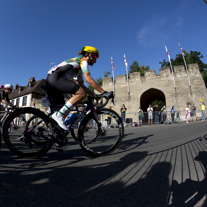 Birmingham 2022 - XXII Commonwealth Games - Women’s Road Race - Ashleigh Moolman-Passio of South African races past Warwick Castle gatehouse