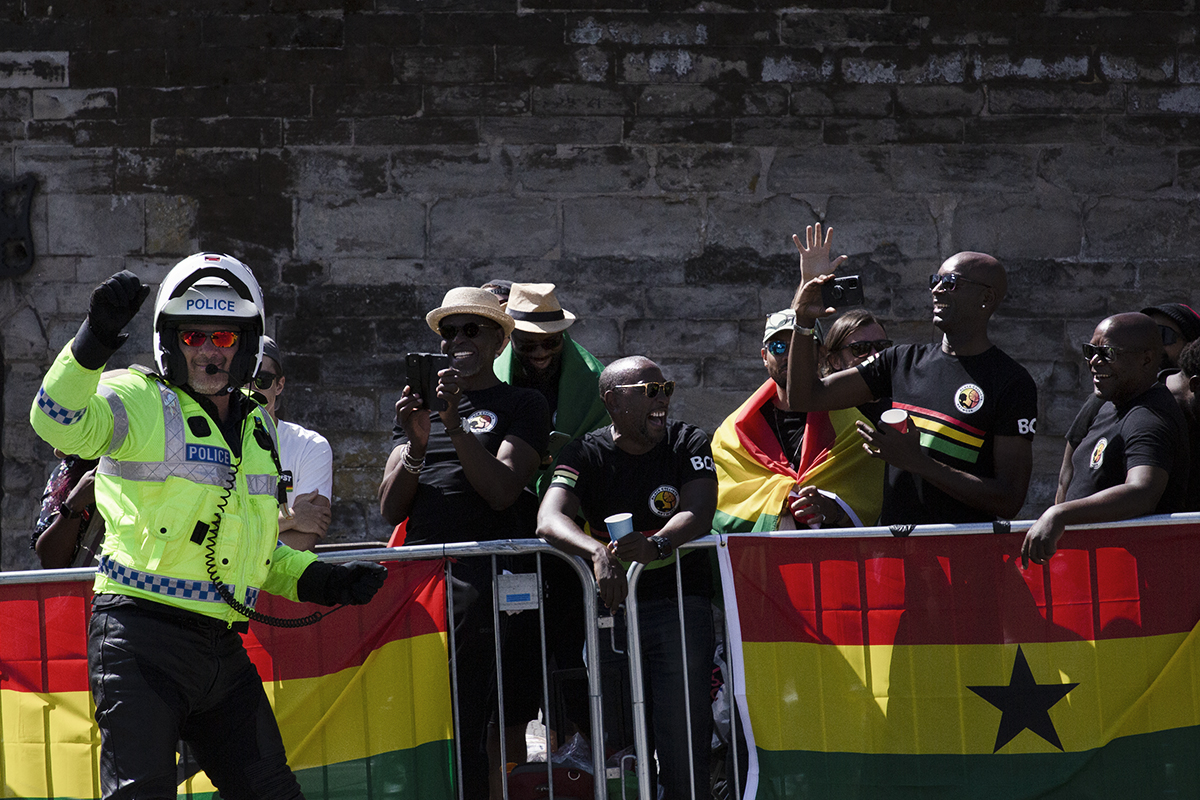 Birmingham 2022 - XXII Commonwealth Games - A policeman dances with the Ghanaian fans