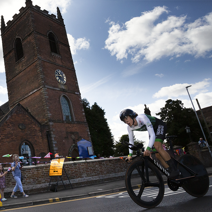 Birmingham 2022 - XXII Commonwealth Games - Women’s Time Trial - Joanna Paterson of Ireland rides past a church as fans look on