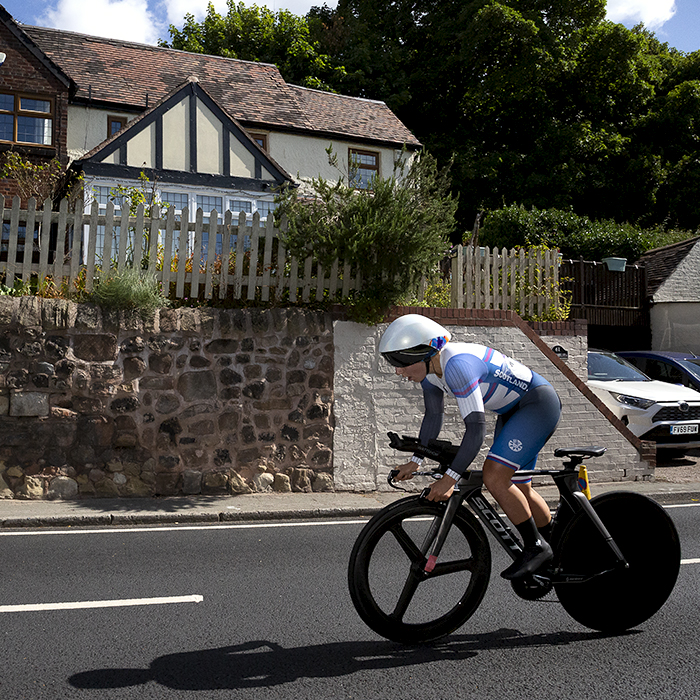 Birmingham 2022 -XXII Commonwealth Games - Women’s Time Trial - Neah Evans from Scotland passes a suburban house during the competition