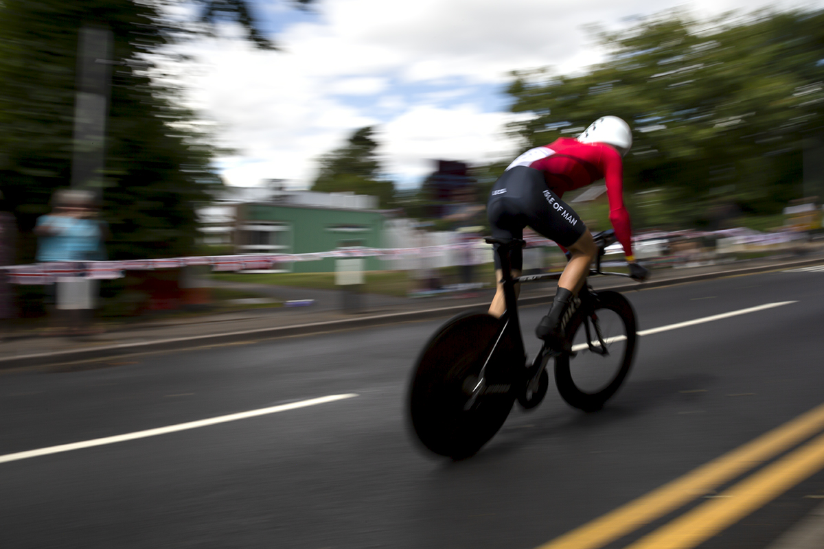 Birmingham 2022 - XXII Commonwealth Games - Men’s Time Trial - Tyler Hannay from the Isle of Man speeds through the streets