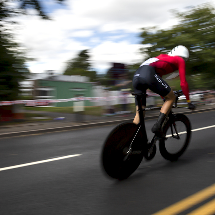 Birmingham 2022 - XXII Commonwealth Games - Men’s Time Trial - Tyler Hannay from the Isle of Man speeds through the streets