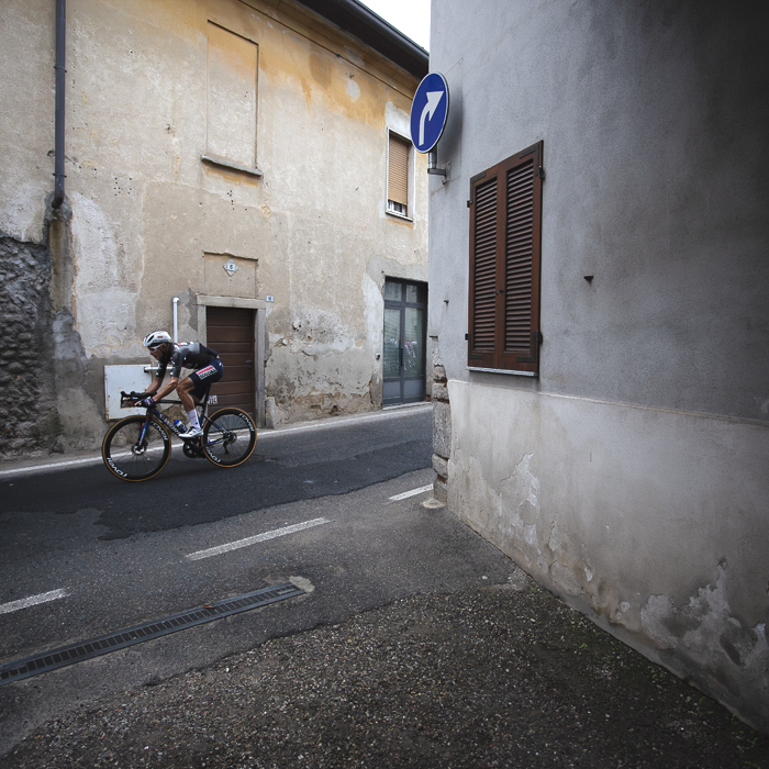 Coppa Bernocchi 2024 - Fausto Masnada rides past traditional Italian buildings