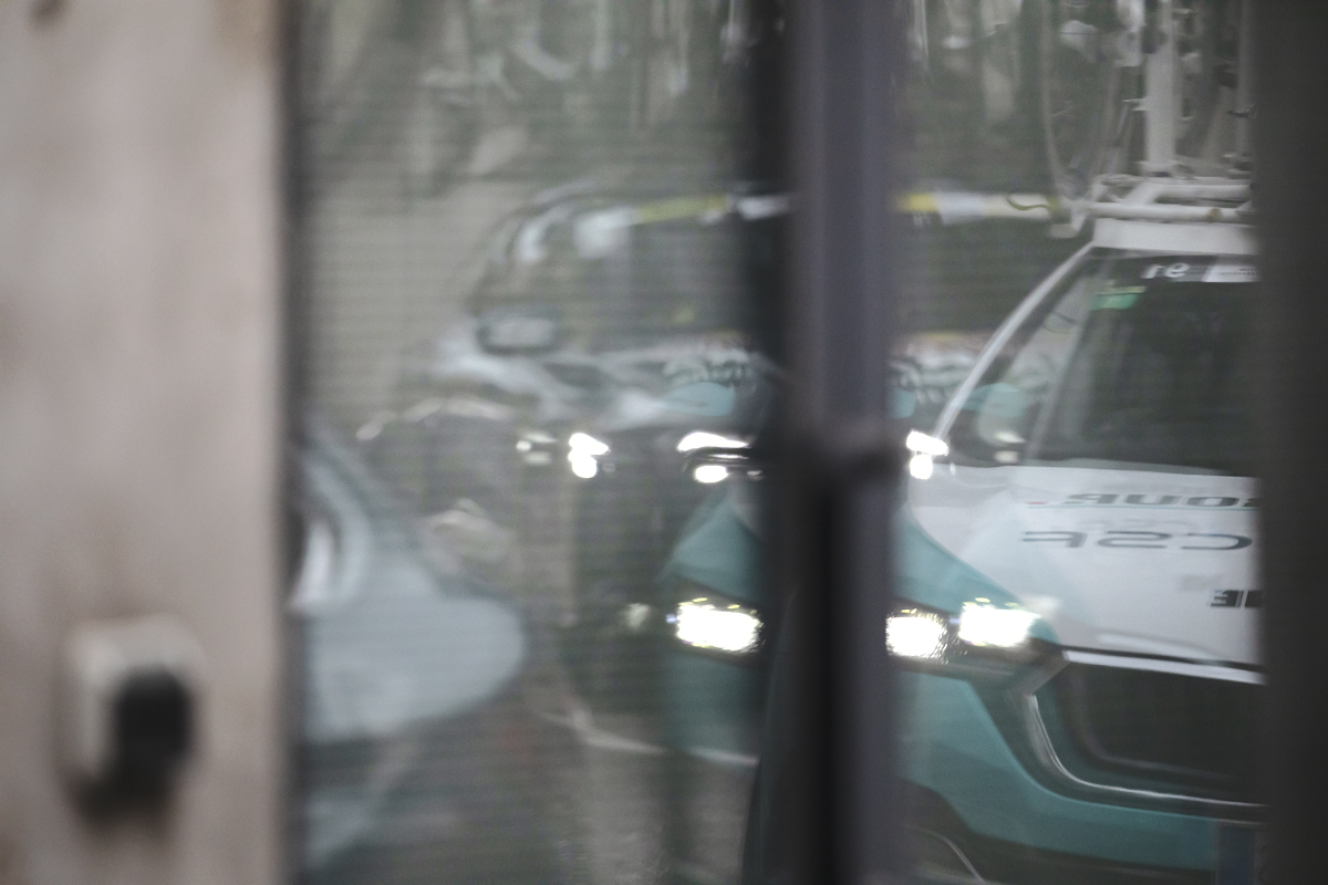 Coppa Bernocchi 2024 - VF Group - Bardiani CSF - Faizanè team cars reflected in a window