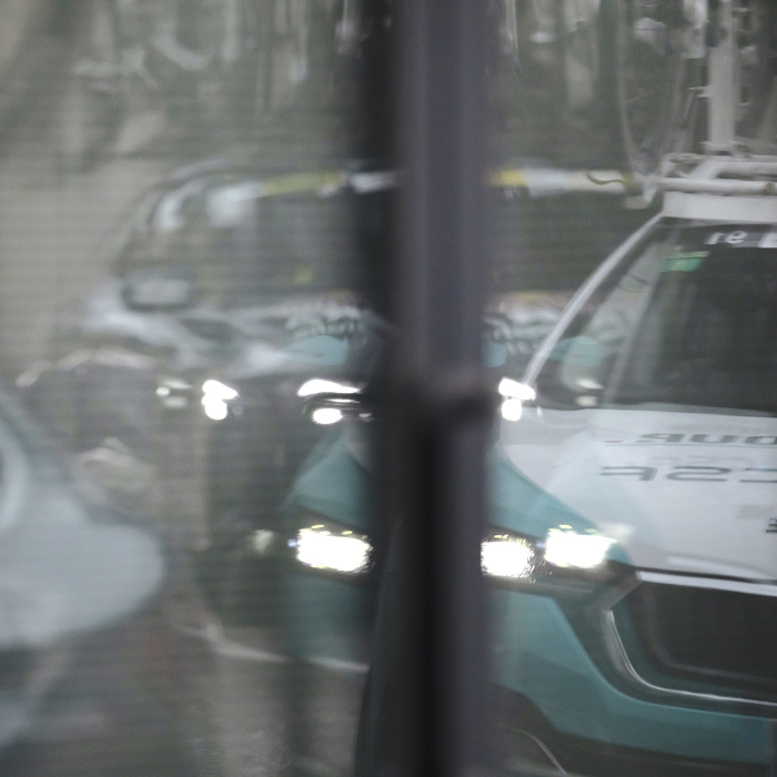 Coppa Bernocchi 2024 - VF Group - Bardiani CSF - Faizanè team cars reflected in a window