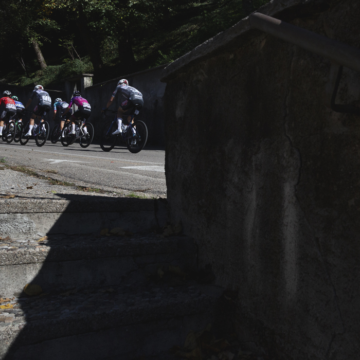 Coppa Bernocchi 2025 - Riders in Castiglione Olona shown from a set of steps leading downwards