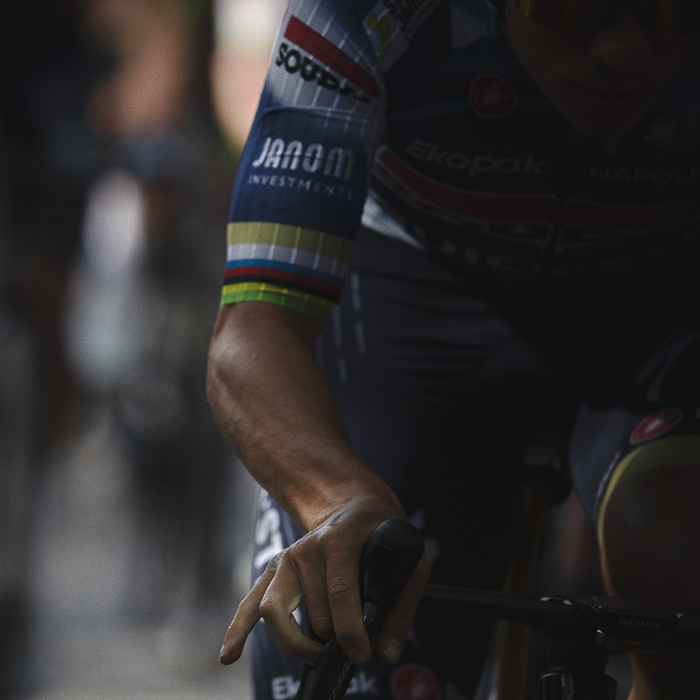 De Brabantse Pijl 2025 - A close up of Remco Evenepoel’s arm showing his Olympic and World Champion’s stripes