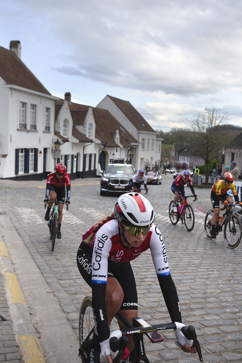 Dwars Door Vlaanderen Vrouwen 2024 - Josie Talbot of Cofidis Women Team races on the cobbles in Nokere