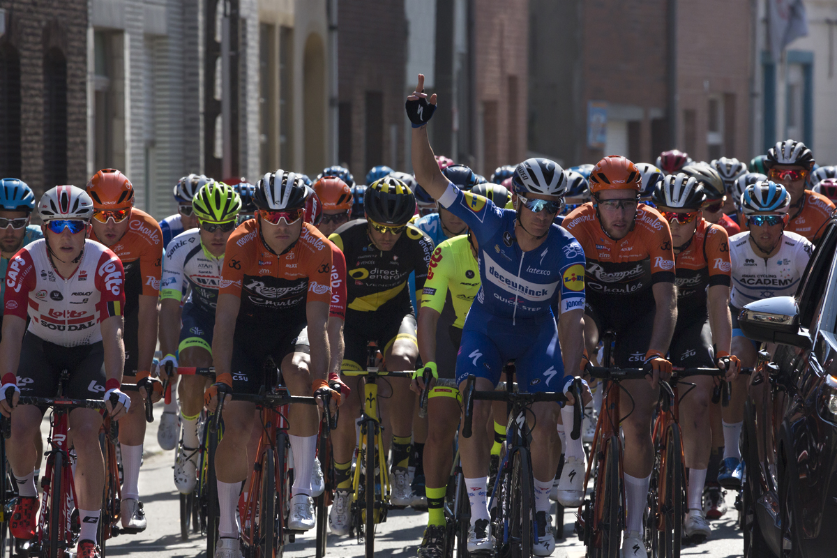 E3 BinckBank Classic 2019 - Iljo Keisse raises his hand in the air with his fingers crossed during the neutralised start