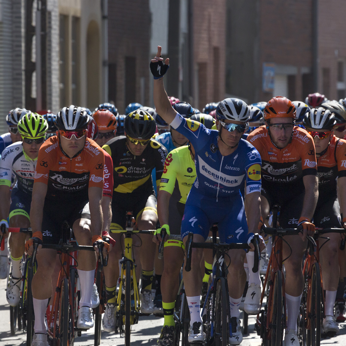 E3 BinckBank Classic 2019 - Iljo Keisse raises his hand in the air with his fingers crossed during the neutralised start