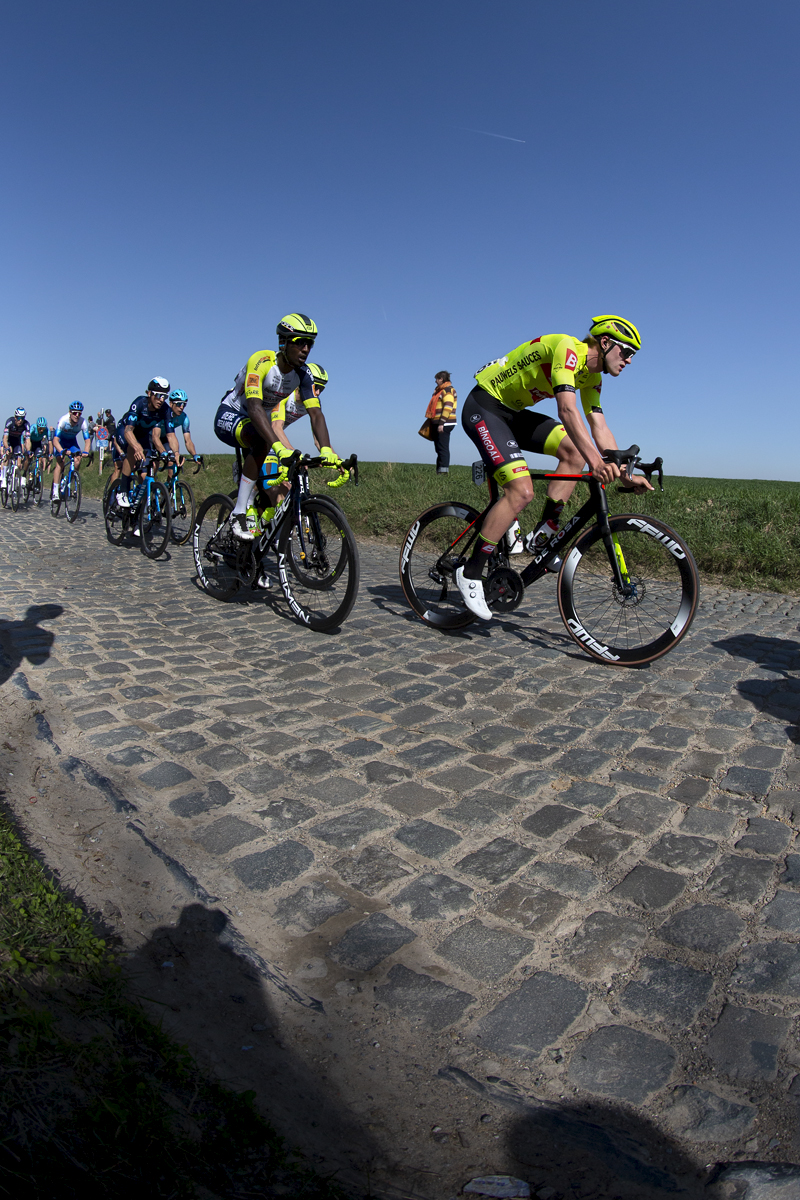 E3 Saxo Bank Classic 2022 - Biniam Girmay of Intermarché - Wanty - Gobert Matériaux and Laurenz Rex of Bingoal Pauwels Sauces WB tackle the cobbles of Holleweg