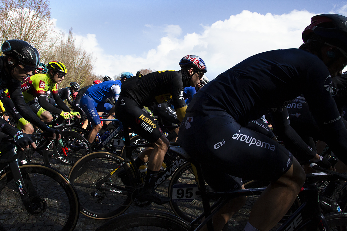 E3 Saxo Classic 2023 - Side on view of Wout van Aert from Jumbo-Visma in the middle of the peloton