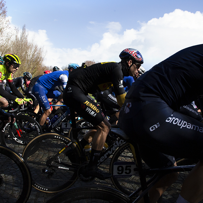 E3 Saxo Classic 2023 - Side on view of Wout van Aert from Jumbo-Visma in the middle of the peloton