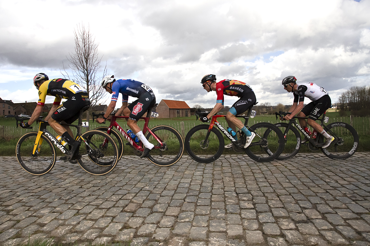 E3 Saxo Classic 2023 - The breakaway group of riders seen from the side on Mariaborrestraat