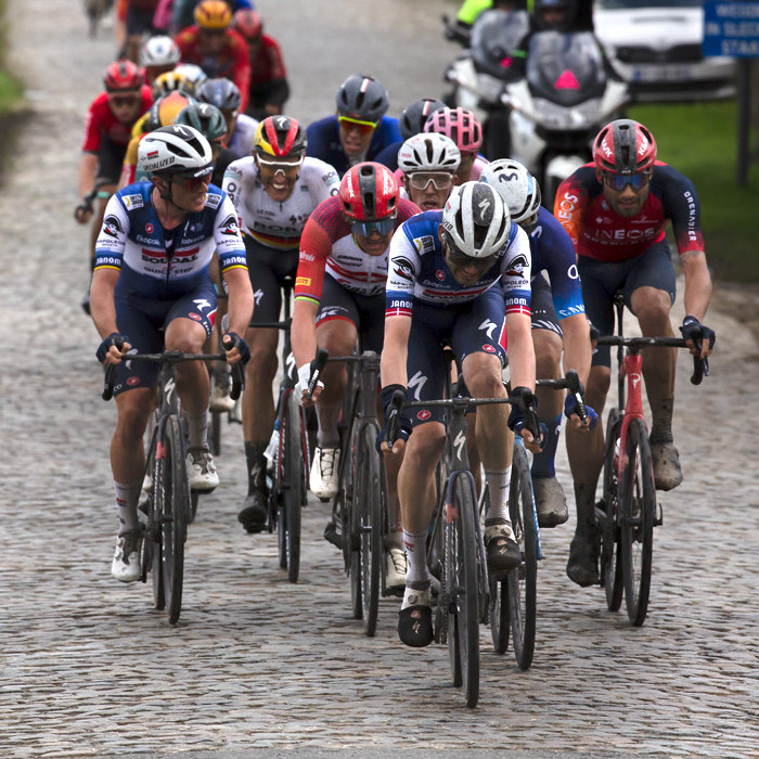 E3 Saxo Classic 2023 - Kasper Asgreen of Soudal Quick-Step with his head down in effort with a group of riders at the top of Mariaborrestraat