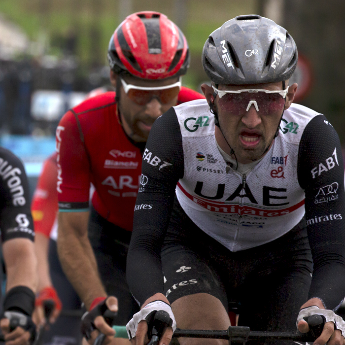 E3 Saxo Classic 2023 - Mikkel Bjerg of Team UAE Emirates splashed in mud as he tackles the cobbles of Mariaborrestraat