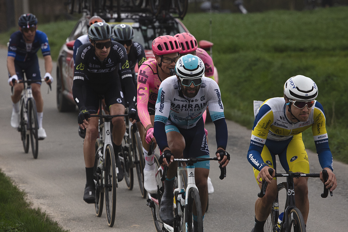 E3 Saxo Classic 2024 - A group of riders races down Langekouter