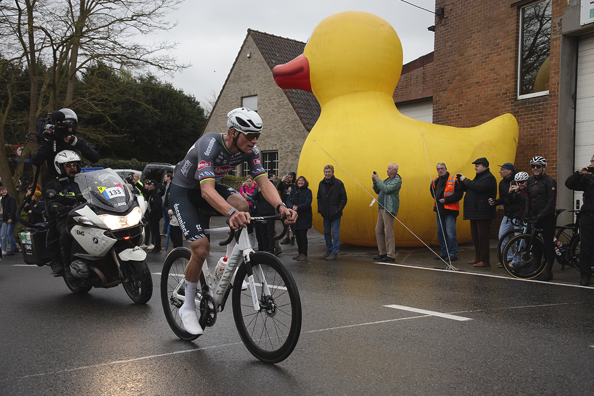 E3 Saxo Classic 2025 - Mathieu van der Poel climbs the Tiegemberg with a giant inflatable duck to one side