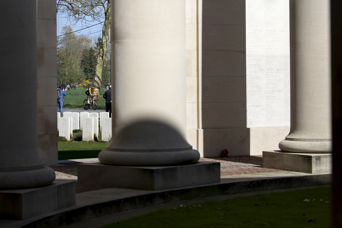 Gent - Wevelgem 2022 - Mike Teunissen of Jumbo-Visma seen through the pillars and cemetery at the Memorial to the Missing