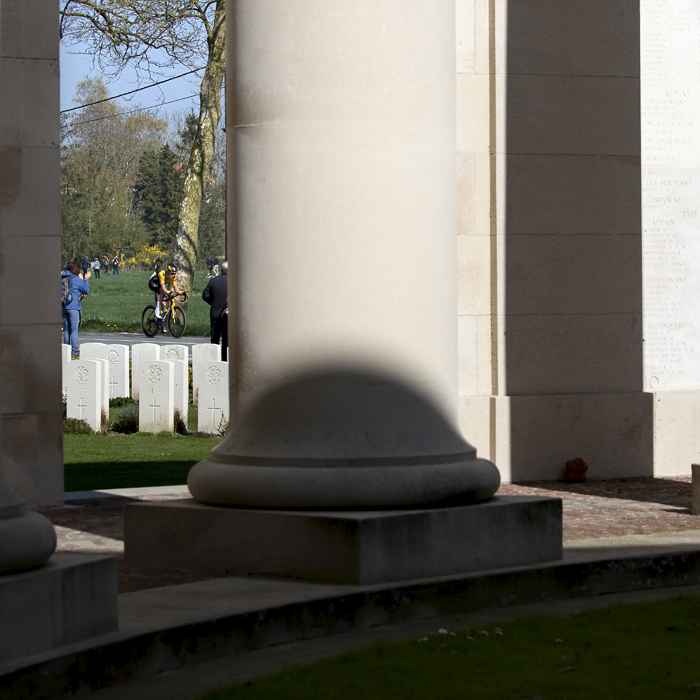 Gent - Wevelgem 2022 - Mike Teunissen of Jumbo-Visma seen through the pillars and cemetery at the Memorial to the Missing