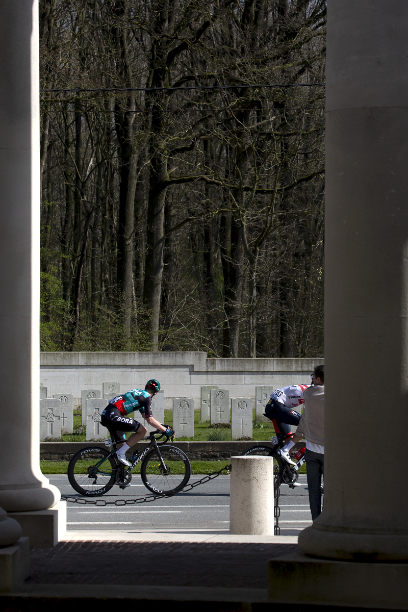 Gent - Wevelgem 2022 - Sam Bennett from BORA-hansgrohe looks towards the cemetery and pays his respects during the race