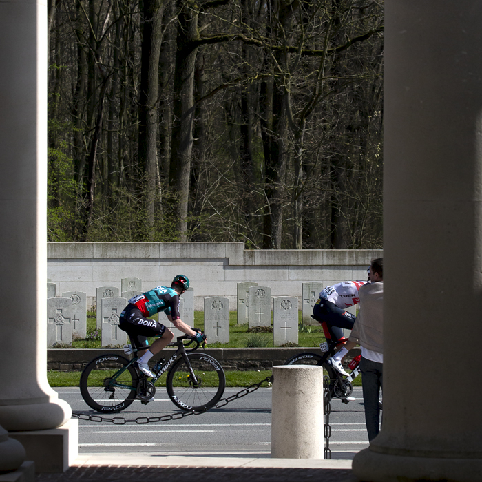 Gent - Wevelgem 2022 - Sam Bennett from BORA-hansgrohe looks towards the cemetery and pays his respects during the race