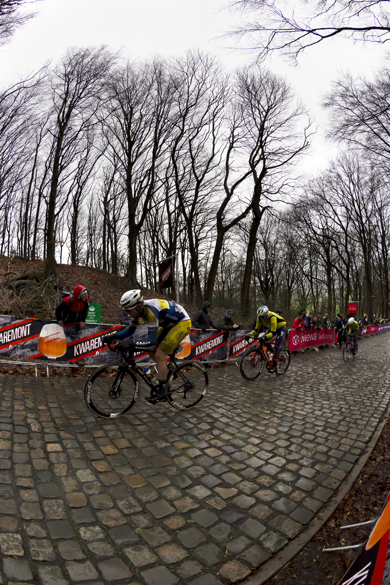 Gent - Wevelgem 2023 - A group led by Sander De Pestel of Team Flanders - Baloise climb the Kemmelberg