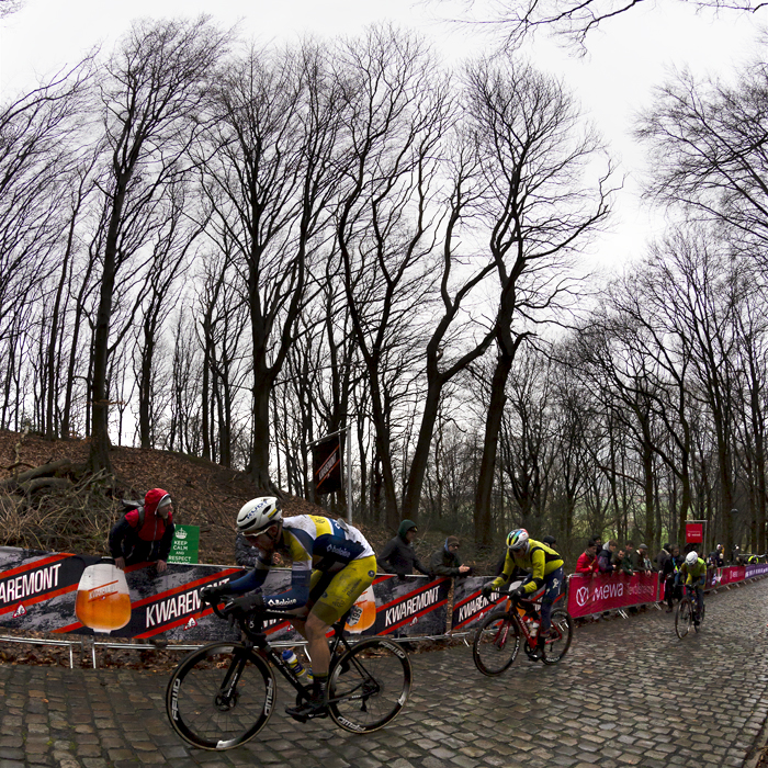 Gent - Wevelgem 2023 - A group led by Sander De Pestel of Team Flanders - Baloise climb the Kemmelberg