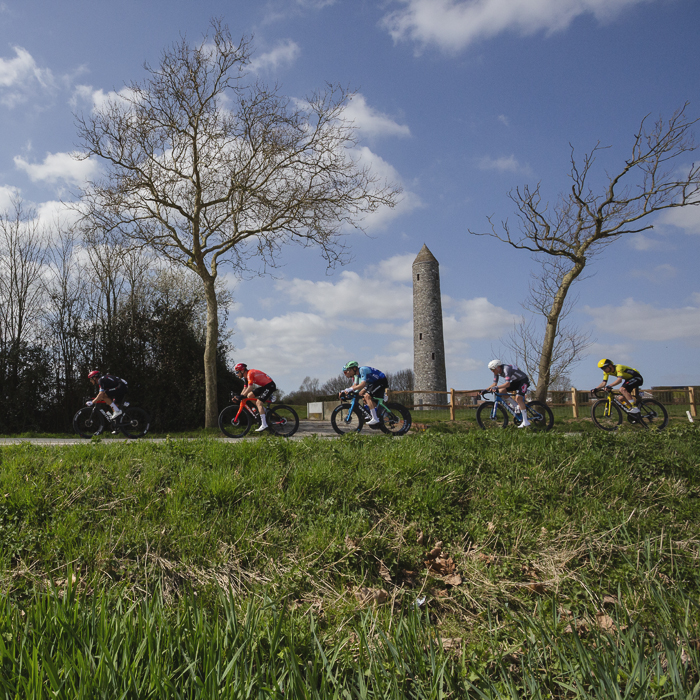 Gent Wevelgem 2025 - Riders pass in front of the Irish Peace Tower
