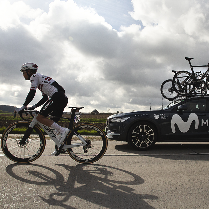 Gent Wevelgem 2025 - Emīls Liepiņš is followed by one of the team cars