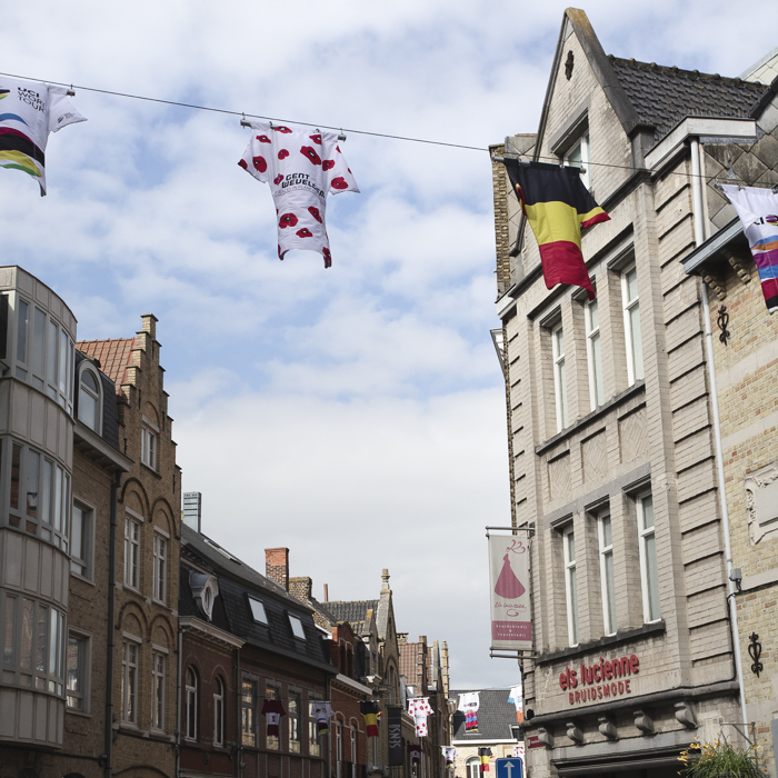 Gent Wevelgem Vrouwen 2024 - Bunting in the form of cyling jerseys is strung across the street in Ieper / Ypres