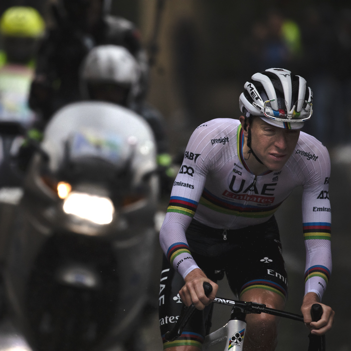 Giro dell’Emilia 2024 - Tadej Pogacar, eyes swollen with the dirt from the road squints as he makes his way towards the San Luca climb