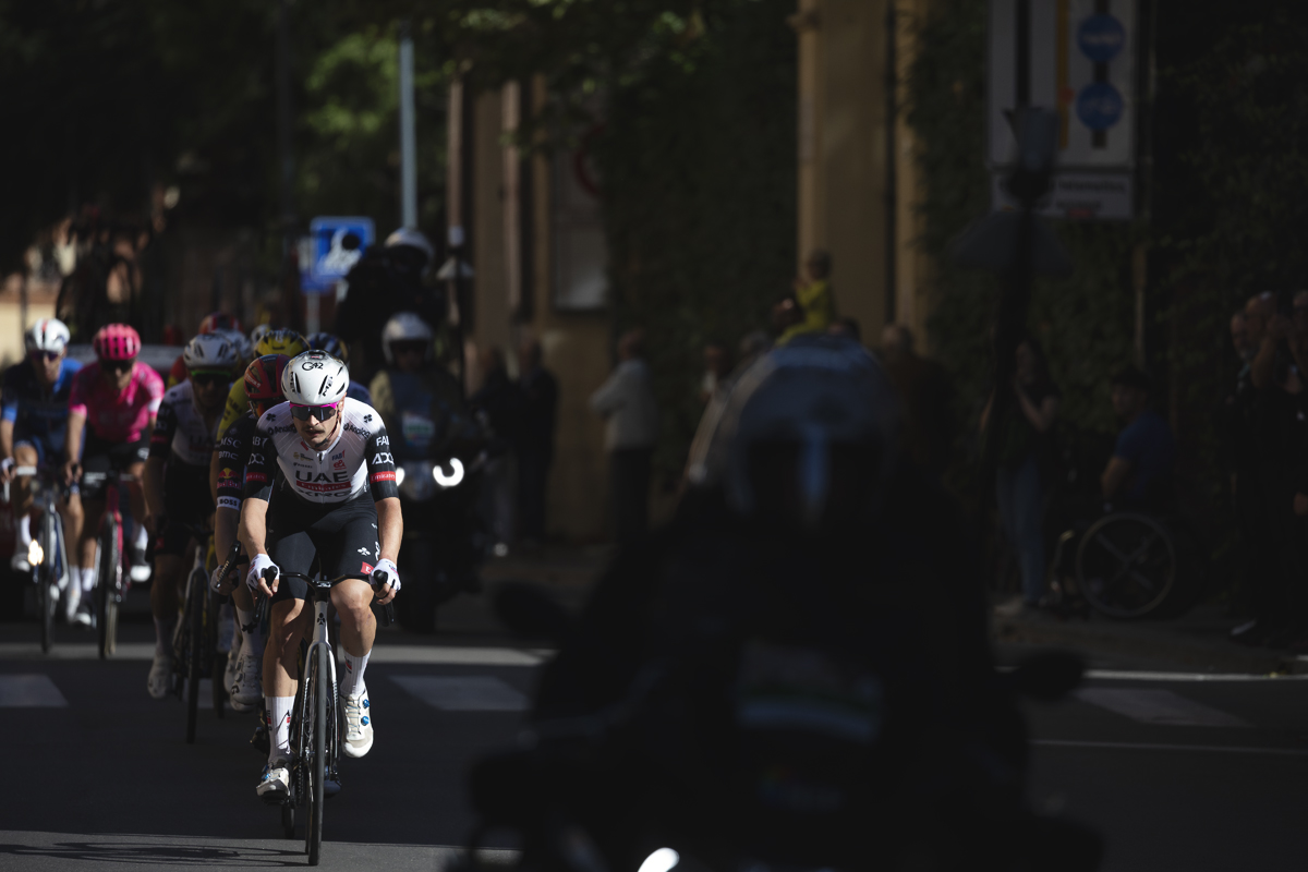 Giro dell’Emilia 2025 - Jay Vine leads a group of riders