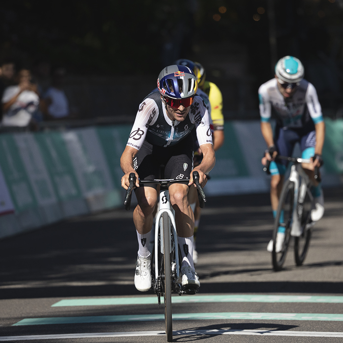Giro dell’Emilia 2025 - Tom Pidcock pushes on as he crosses the finish line on one of the early laps