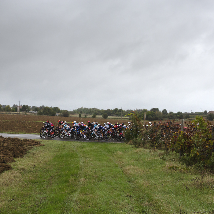 Giro dell'Emilia Internazionale Donne Elite 2024 - Riders against a backdrop of ploughed farmland in Castelvetro
