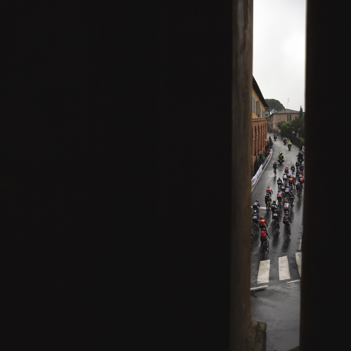 Giro dell'Emilia Internazionale Donne Elite 2024 - The race from behind as it climbs Via di San Luca viewed between columns