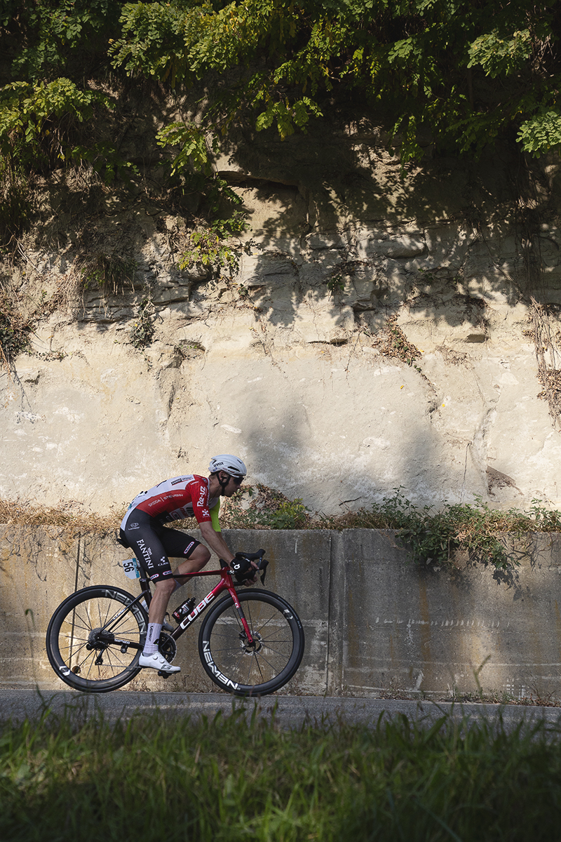 Gran Piemonte 2025 - Dion Smith of Intermarché - Wanty is illuminated by the afternoon sunlight