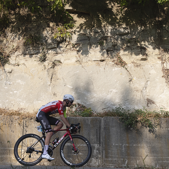 Gran Piemonte 2025 - Dion Smith of Intermarché - Wanty is illuminated by the afternoon sunlight